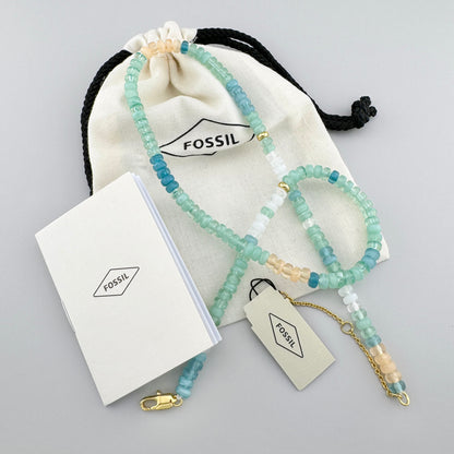 Beaded necklace in turquoise and gold tones, by American brand Fossil.