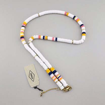 Necklace made of white beads with colorful and gold accents, by American brand Fossil.