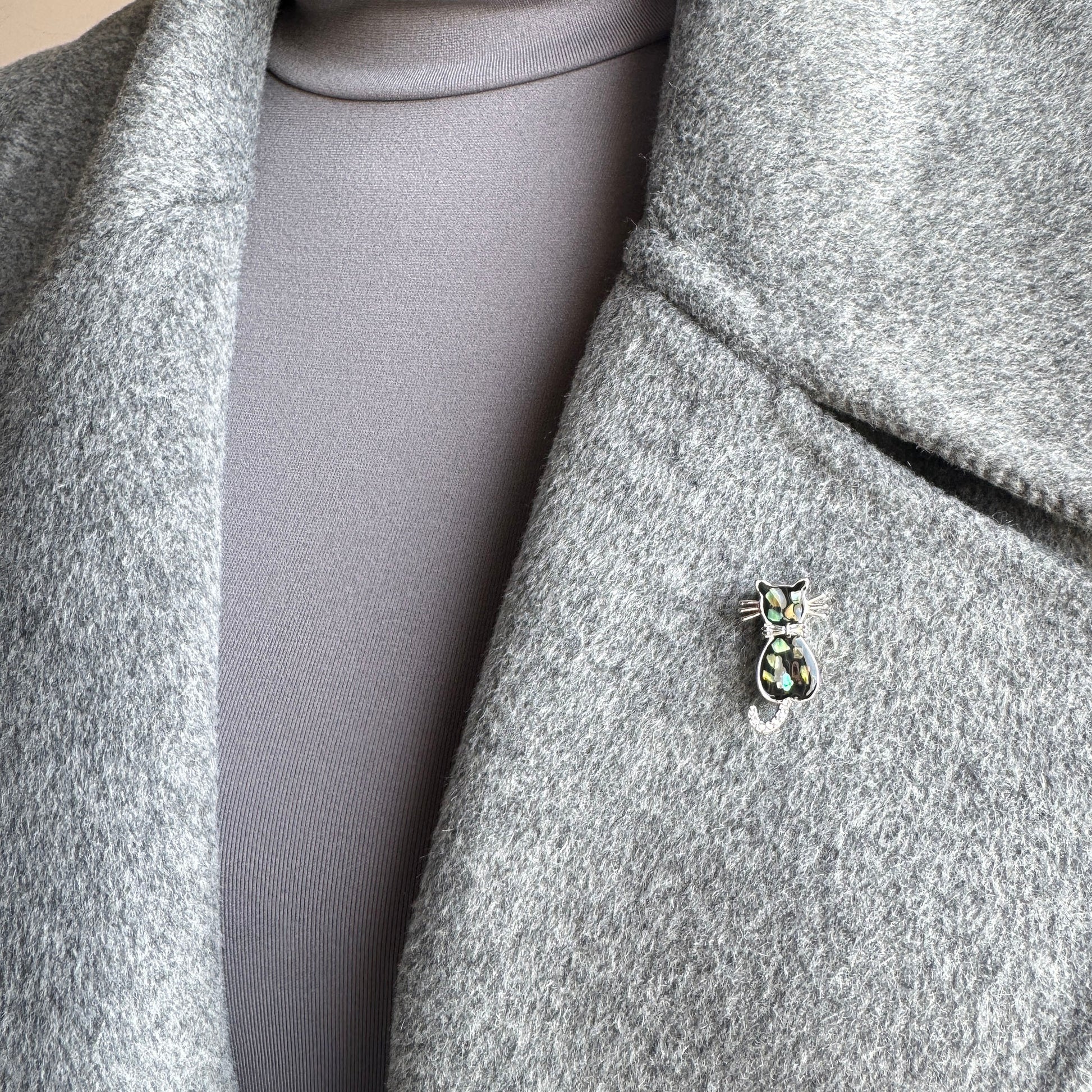 Cat-shaped brooch with mother-of-pearl accents and rhinestones, Spanish brand Maravillas.