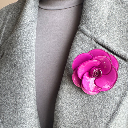 Rose-shaped brooch made of glossy fuchsia acrylic, Spanish brand Sonata.