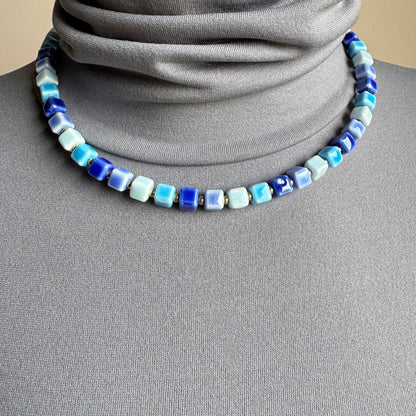 Necklace with glossy blue ceramic cubes, French brand Ikita.