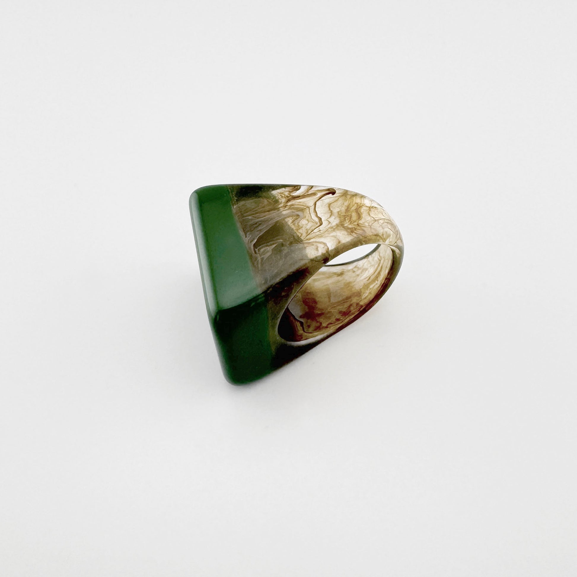 Plastic ring in green with a brown marbled pattern, Spanish brand Sonata.