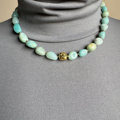Necklace with blue amazonite stones and gold spacers, French brand Ikita.