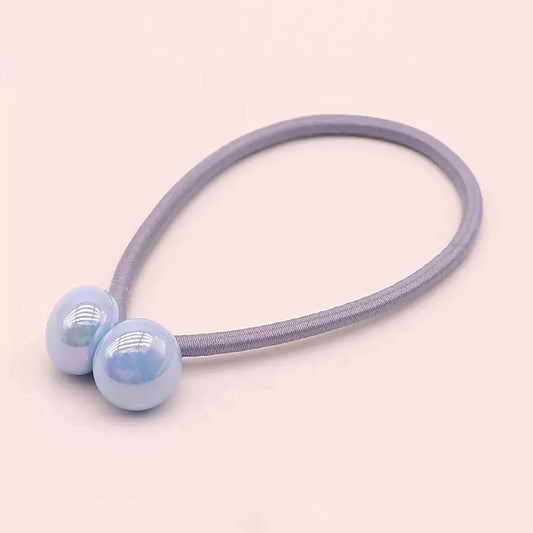 Hair tie with pearly blue beads.