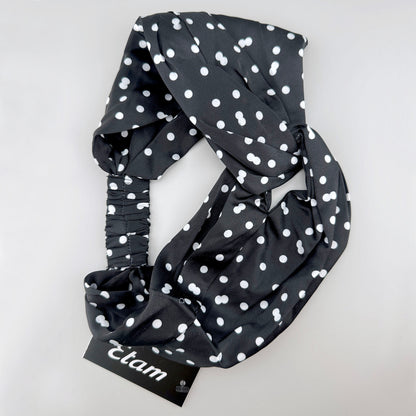 Headband with white polka dots, brand Etam.