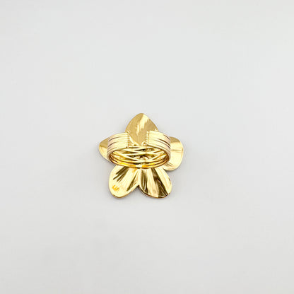 Anillo flor Cannelle con acabado dorado y forma ajustable