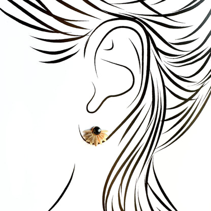 Agate stud earrings worn on ear creating a subtle modern accent