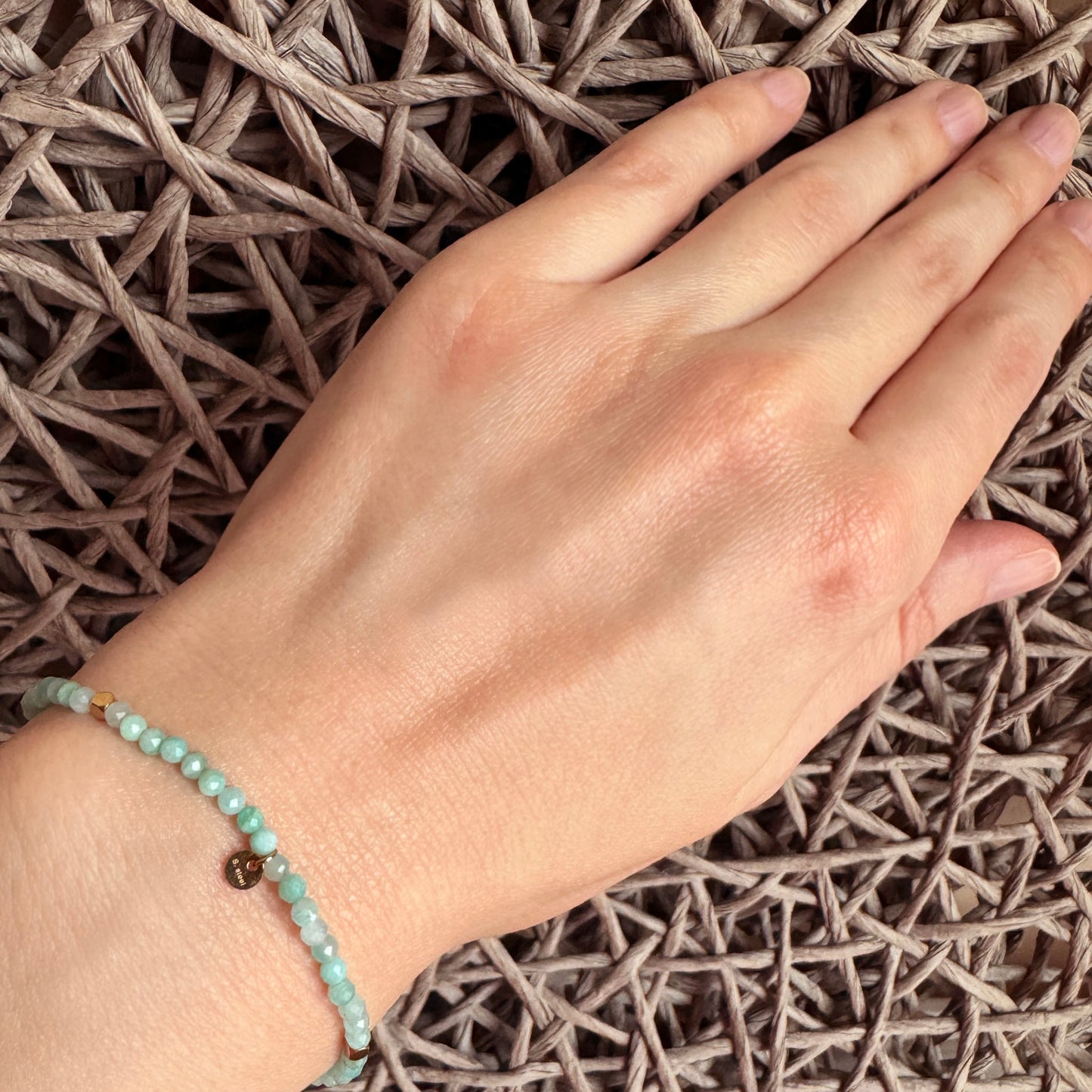 Amazonite bracelet IRL worn on the wrist with soft turquoise faceted beads
