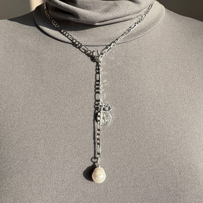 Elegant silver Pilgrim necklace with baroque pearl and medallion detail worn on neck