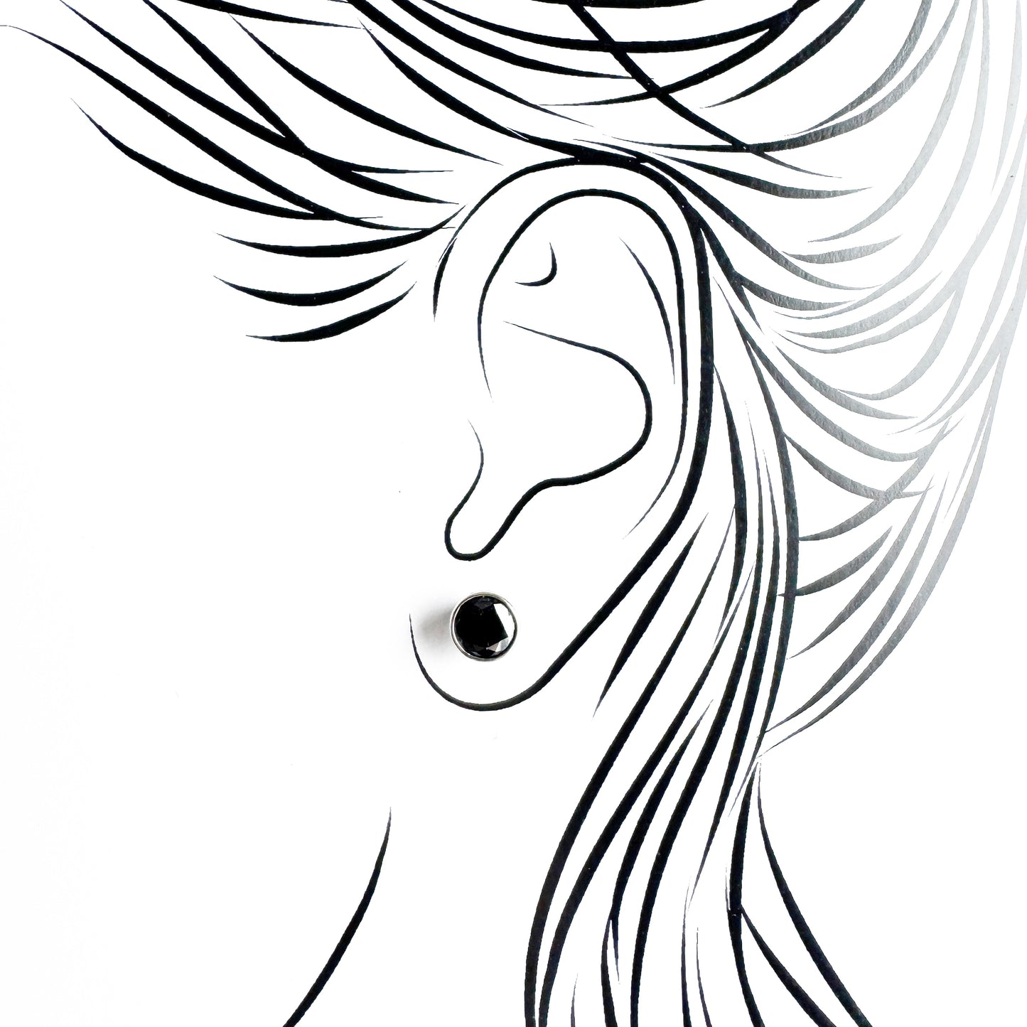 Silver black stud earrings Universe worn on the ear with a polished setting
