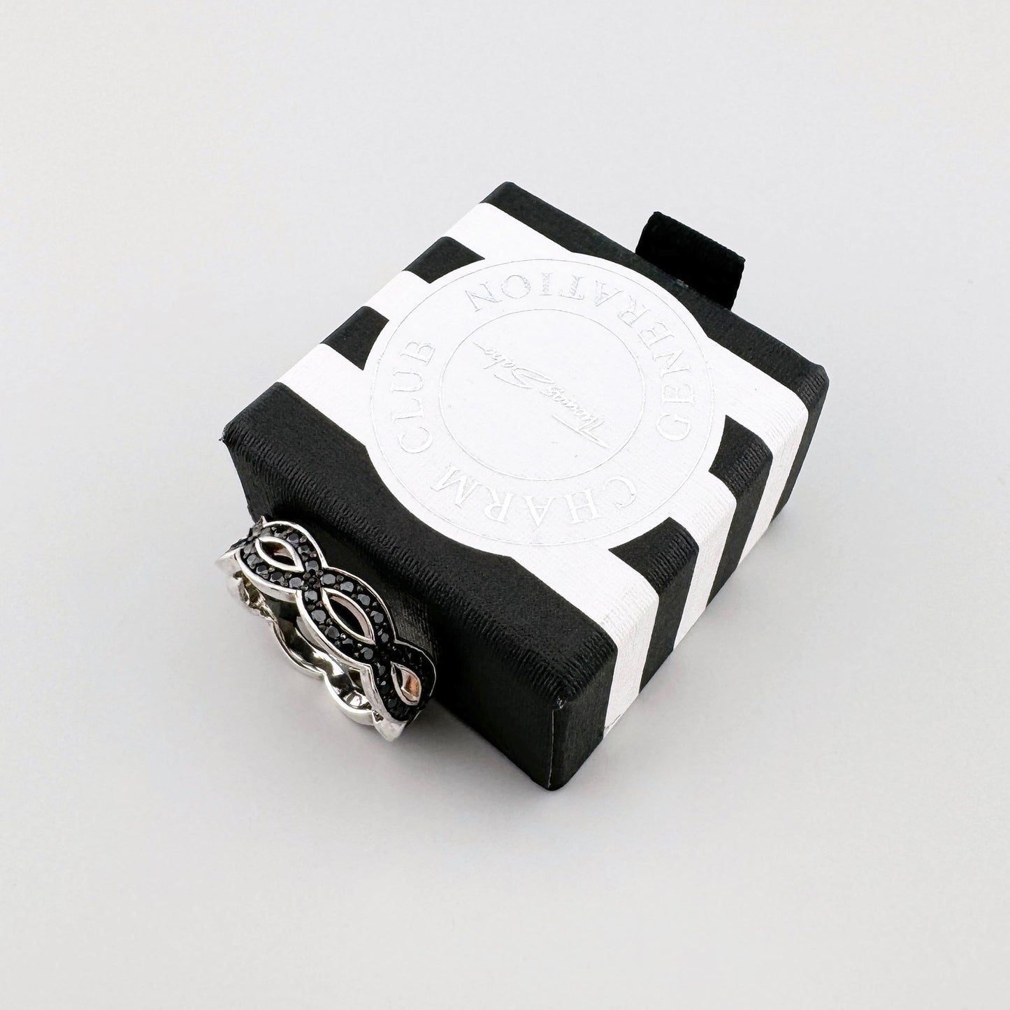 Silver Thomas Sabo ring with black cubic zirconia displayed on its branded box