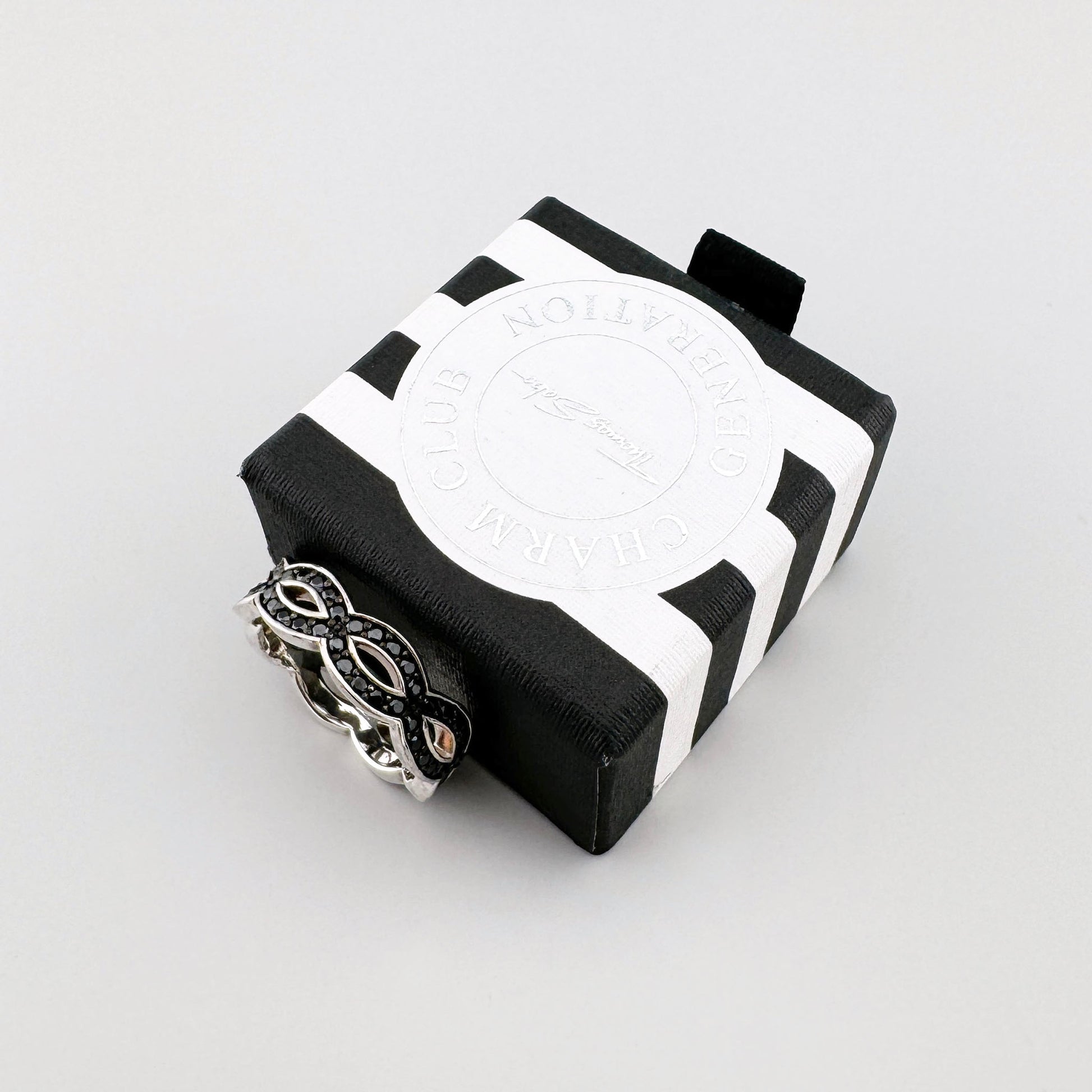 Silver Thomas Sabo ring with black cubic zirconia displayed on its branded box