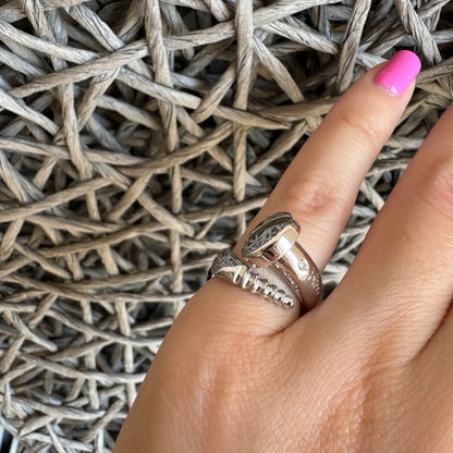 Bliss Gioielli silver screw-motif ring with a small natural diamond, clean industrial lines