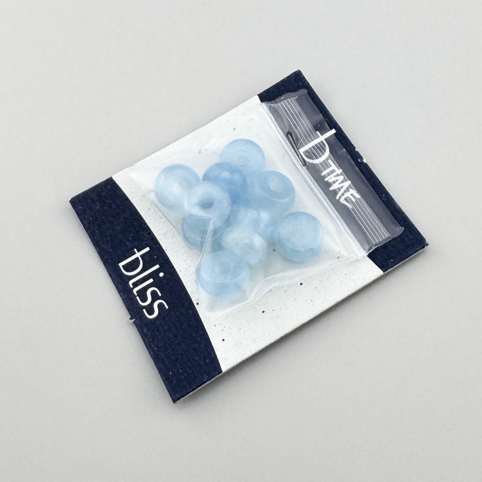 Blue aquamarine beads Bliss Gioielli in a soft milky shade and rounded donut shape