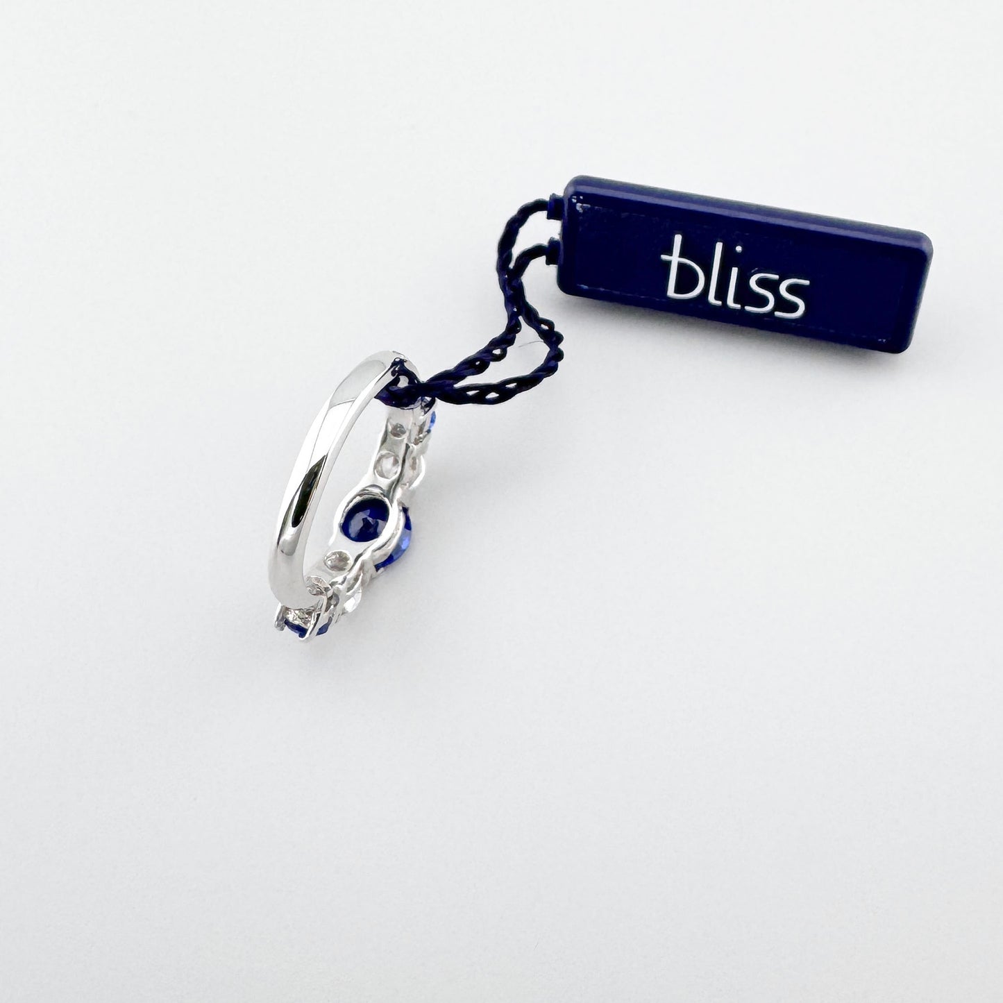 Anillo Bliss Gioielli con piedra azul central y detalles transparentes