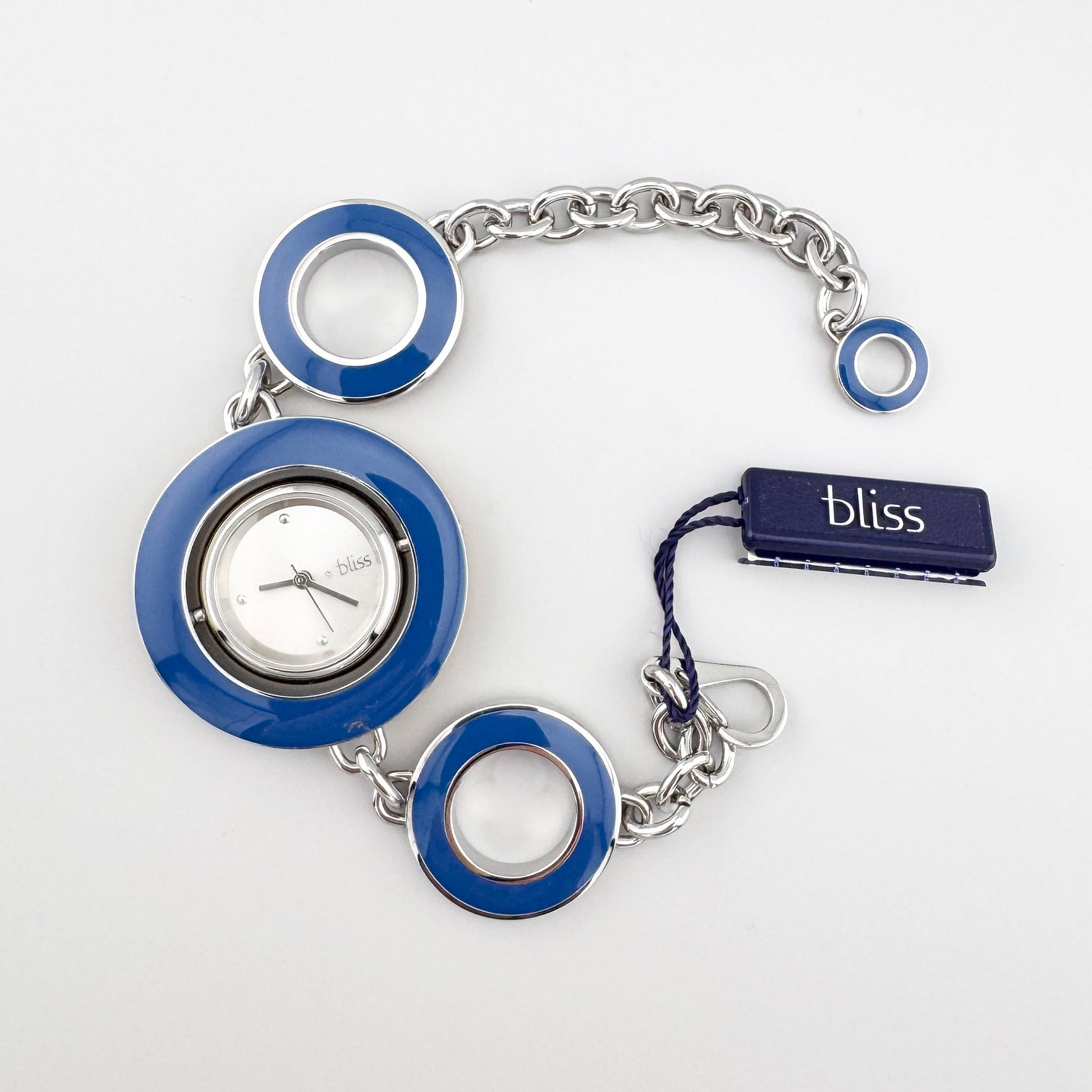 Minimalist reversible bracelet watch with enamel details