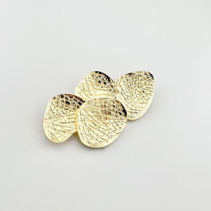 Broche géométrique dorée Sonata avec disques superposés et surface texturée