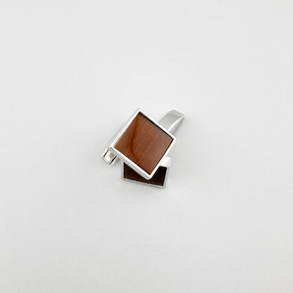 Silver cufflinks Bliss Gioielli with a brown stone and a clean geometric shape