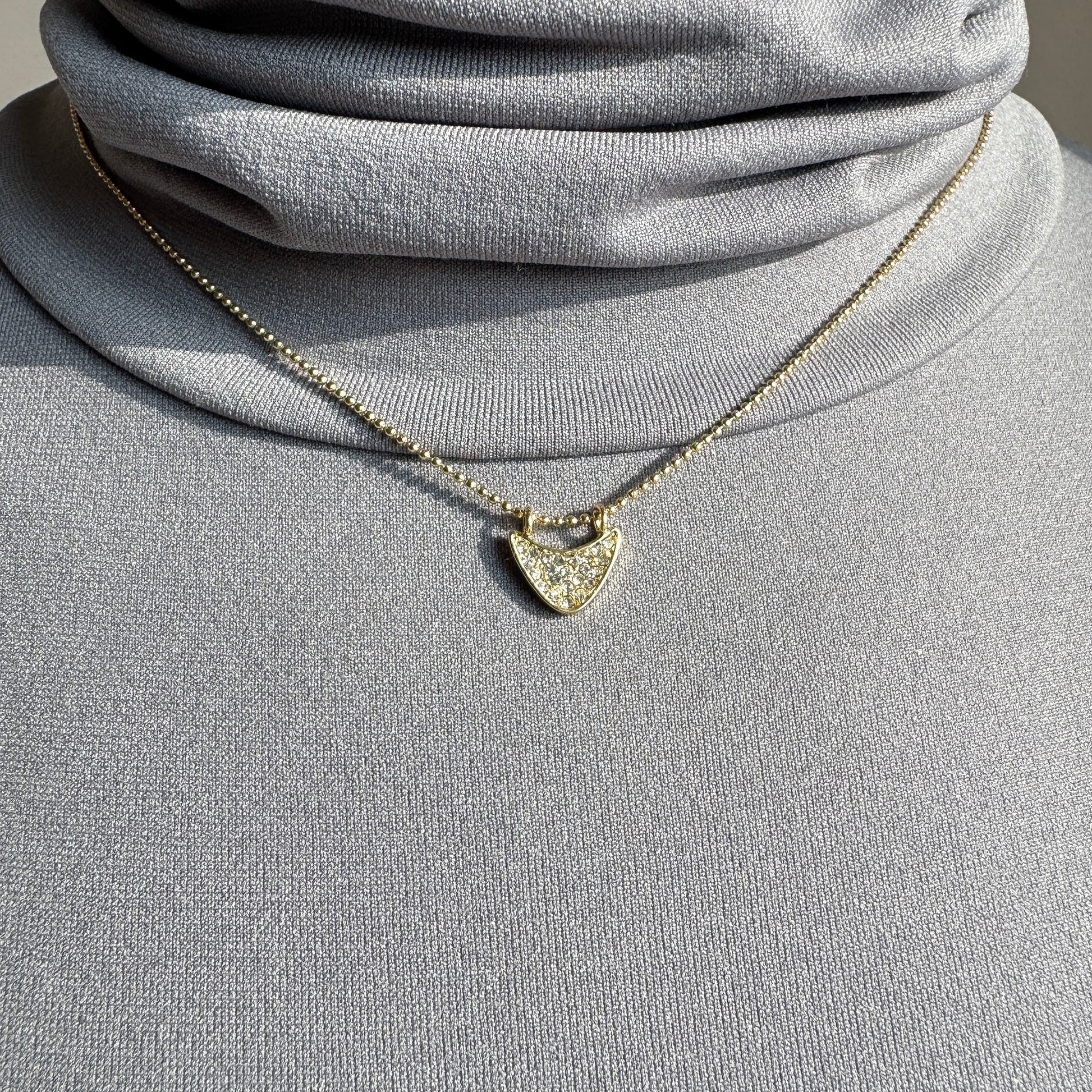 Elegant Pilgrim necklace with small zirconia pendant on fine gold-plated chain
