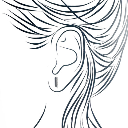 Silver cz stud earrings Universe worn on the ear in a slim vertical design
