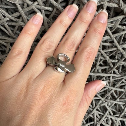 Elegant silver designer ring by Bliss Gioielli worn on hand