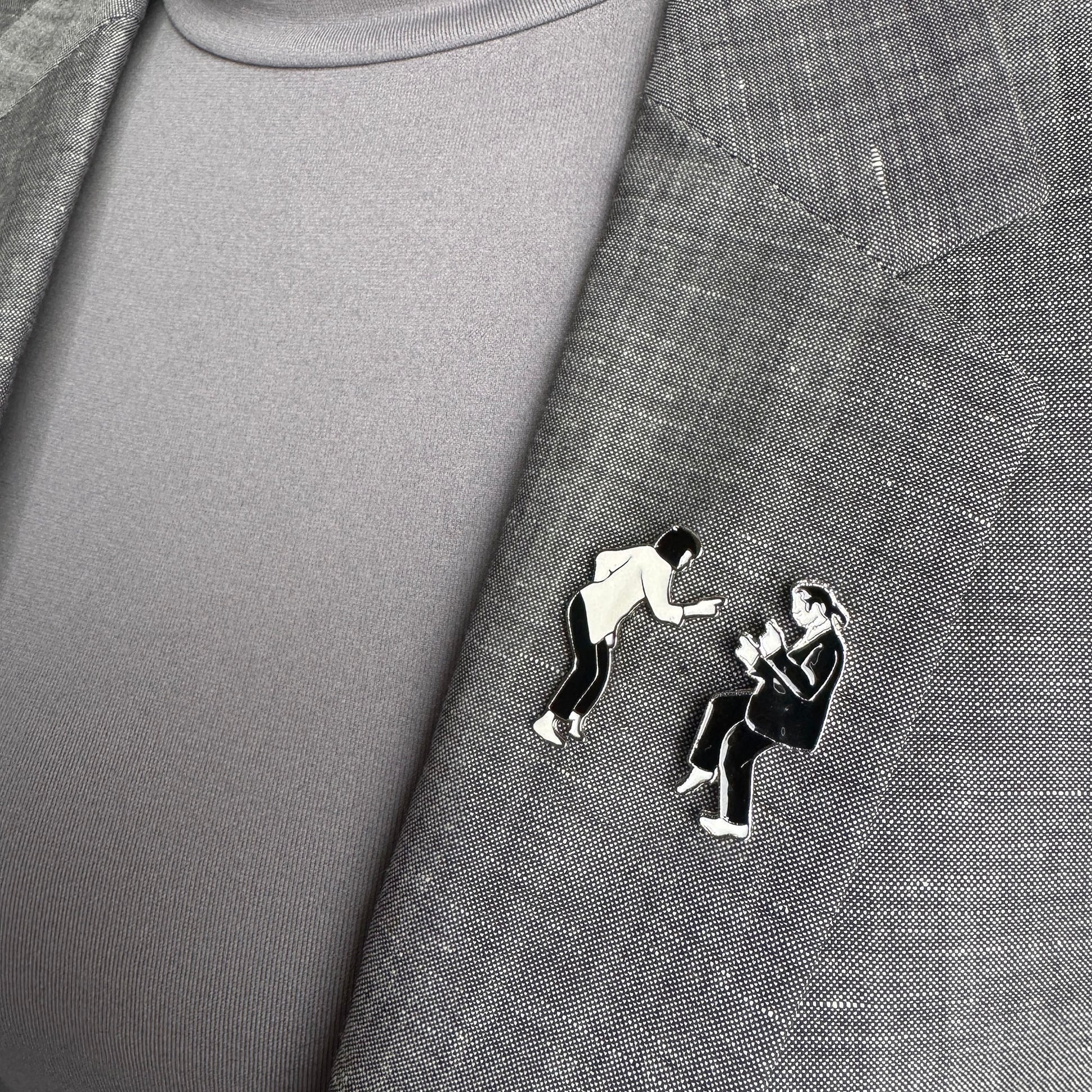Dance duo pin set Sonata worn on a blazer in a graphic black-and-white style