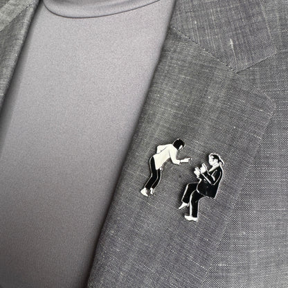 Dance duo pin set Sonata worn on a blazer in a graphic black-and-white style