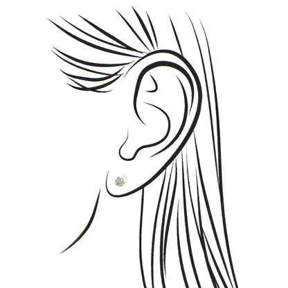 Small silver crystal stud earrings shown in ear outline illustration