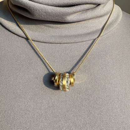 Pilgrim gold necklace with multiple round pendants and crystal accents