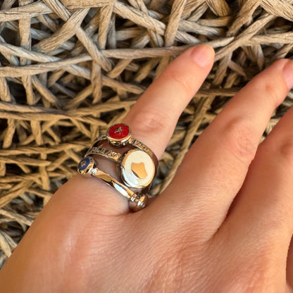 Silver enamel ring by Bliss Gioielli worn on hand with bold geometric accents