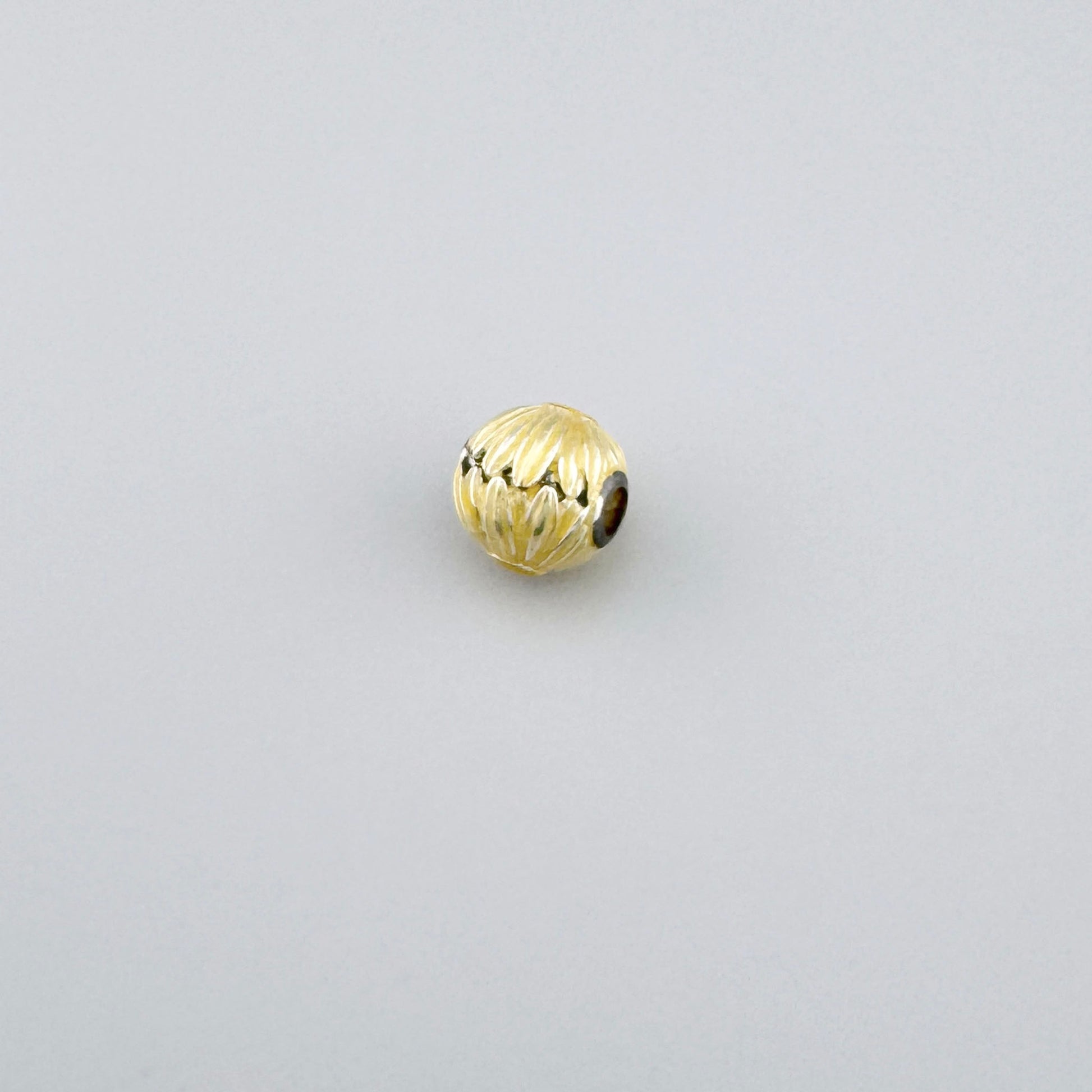 Charm esférico Thomas Sabo con grabado de marca y motivo solar