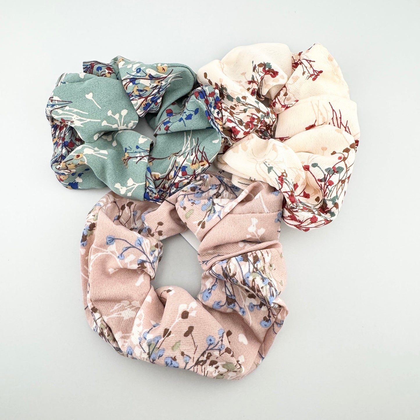 Romantic floral scrunchie set by IRL in blush, cream, and sage tones