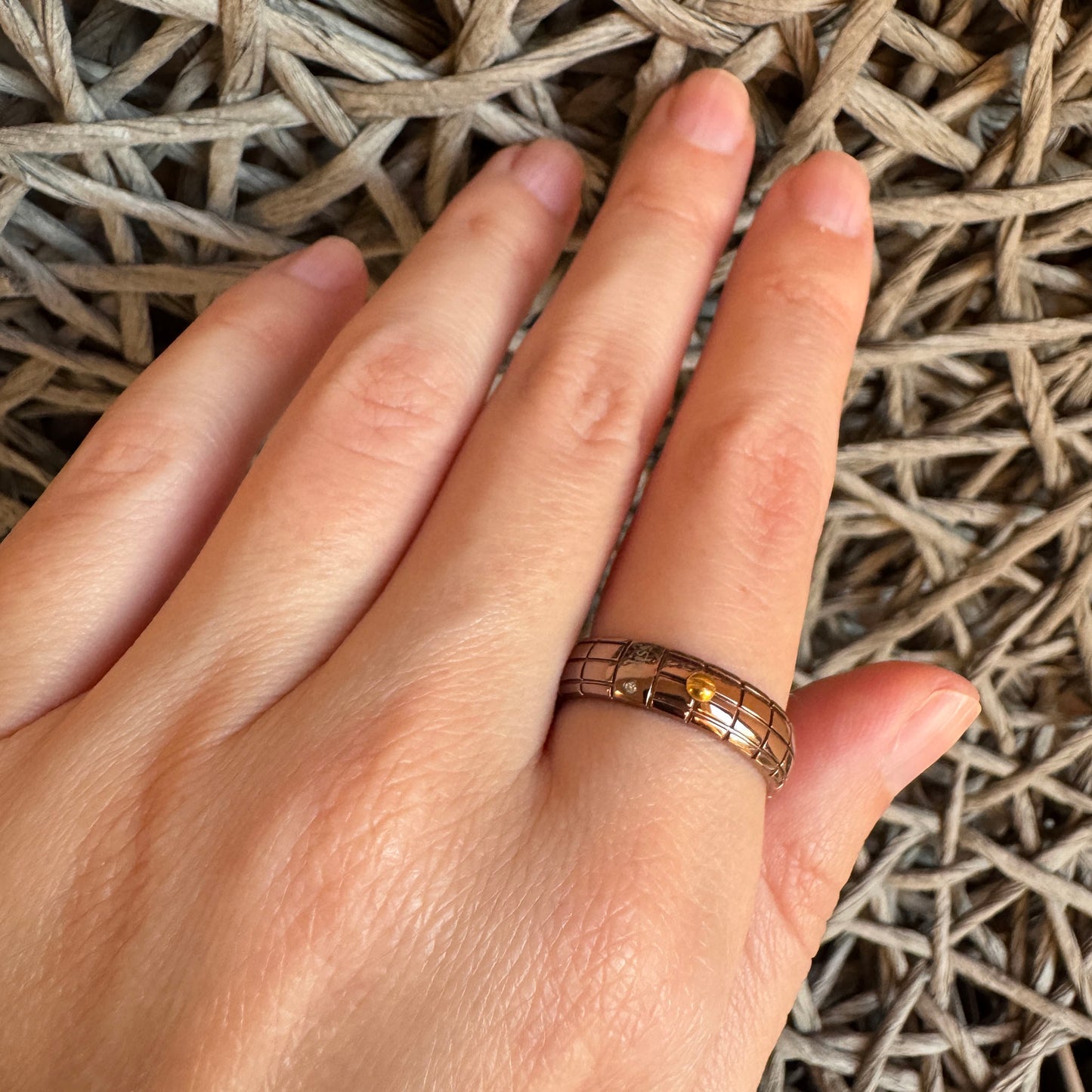 Silver ring with gold accent by Bliss Gioielli worn on hand