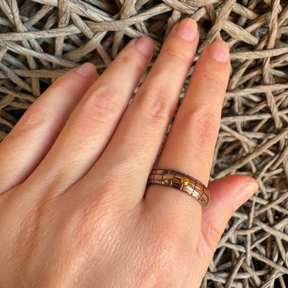 Silver ring with gold accent by Bliss Gioielli worn on hand