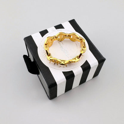 Gold-plated Thomas Sabo chain ring with zirconia displayed on a branded box