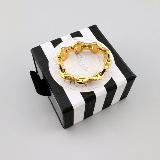 Gold-plated Thomas Sabo chain ring with zirconia displayed on a branded box
