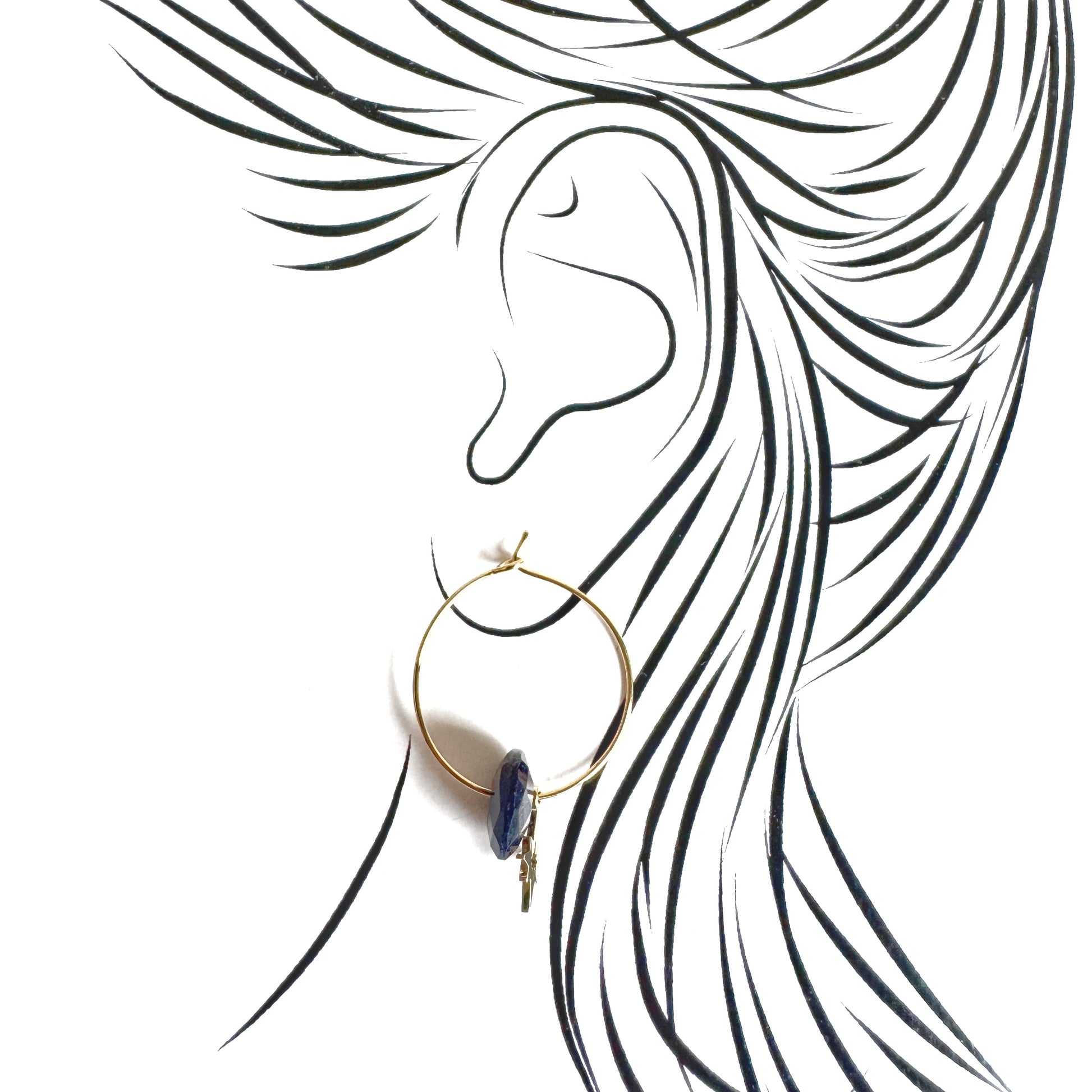 Gold IRL hoop earrings with midnight blue stone and star charm on ear illustration