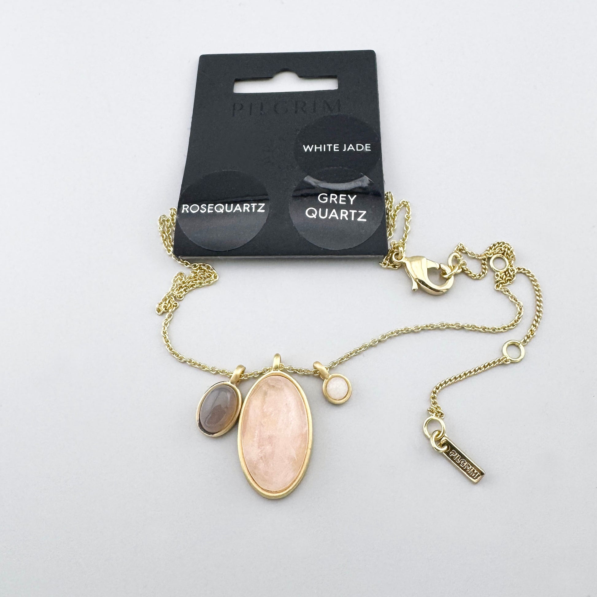 Pilgrim Halskette mit Rosenquarz, Jadeit und grauem Quarz im goldfarbenen Design