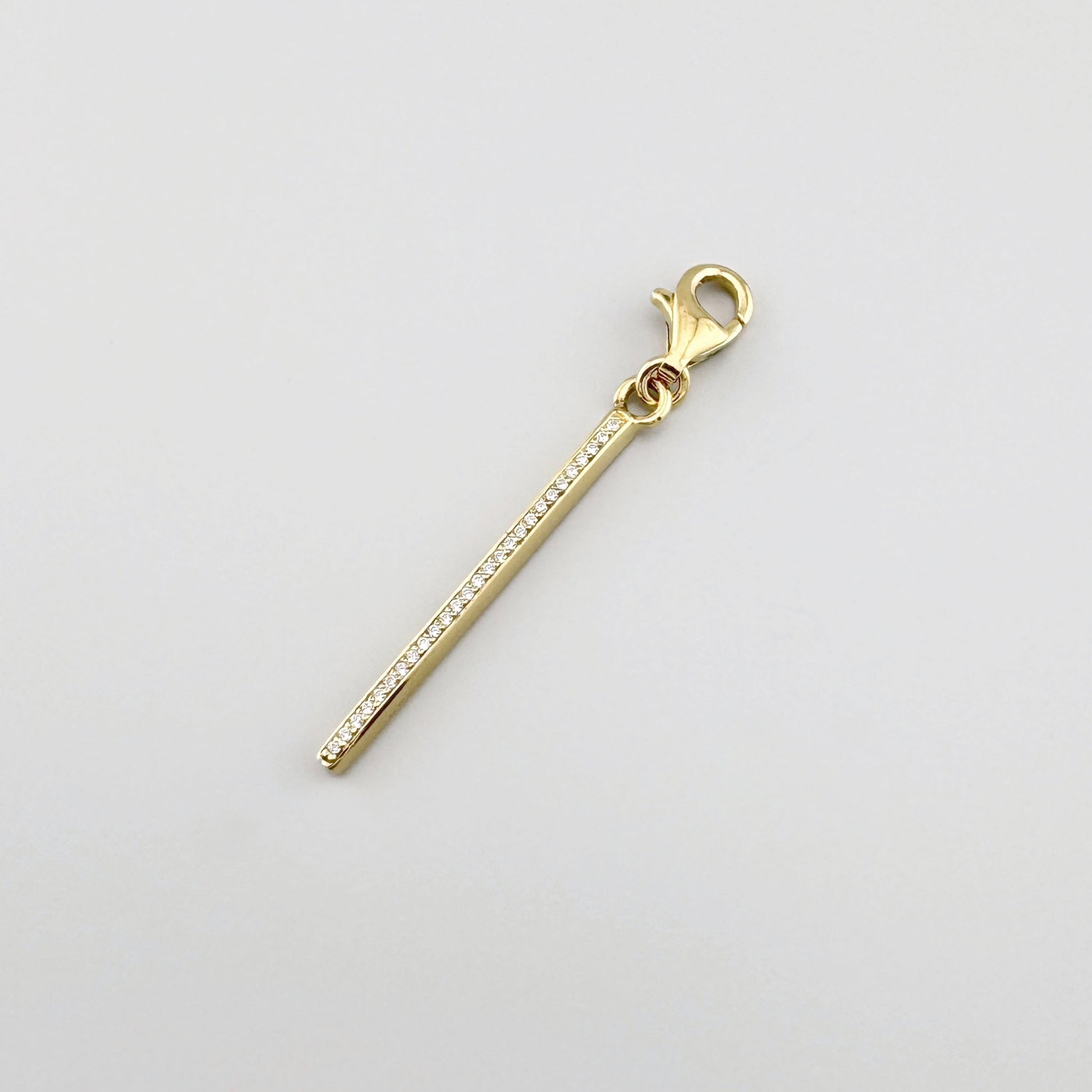 Gold-plated zirconia bar charm Thomas Sabo with a slim polished form