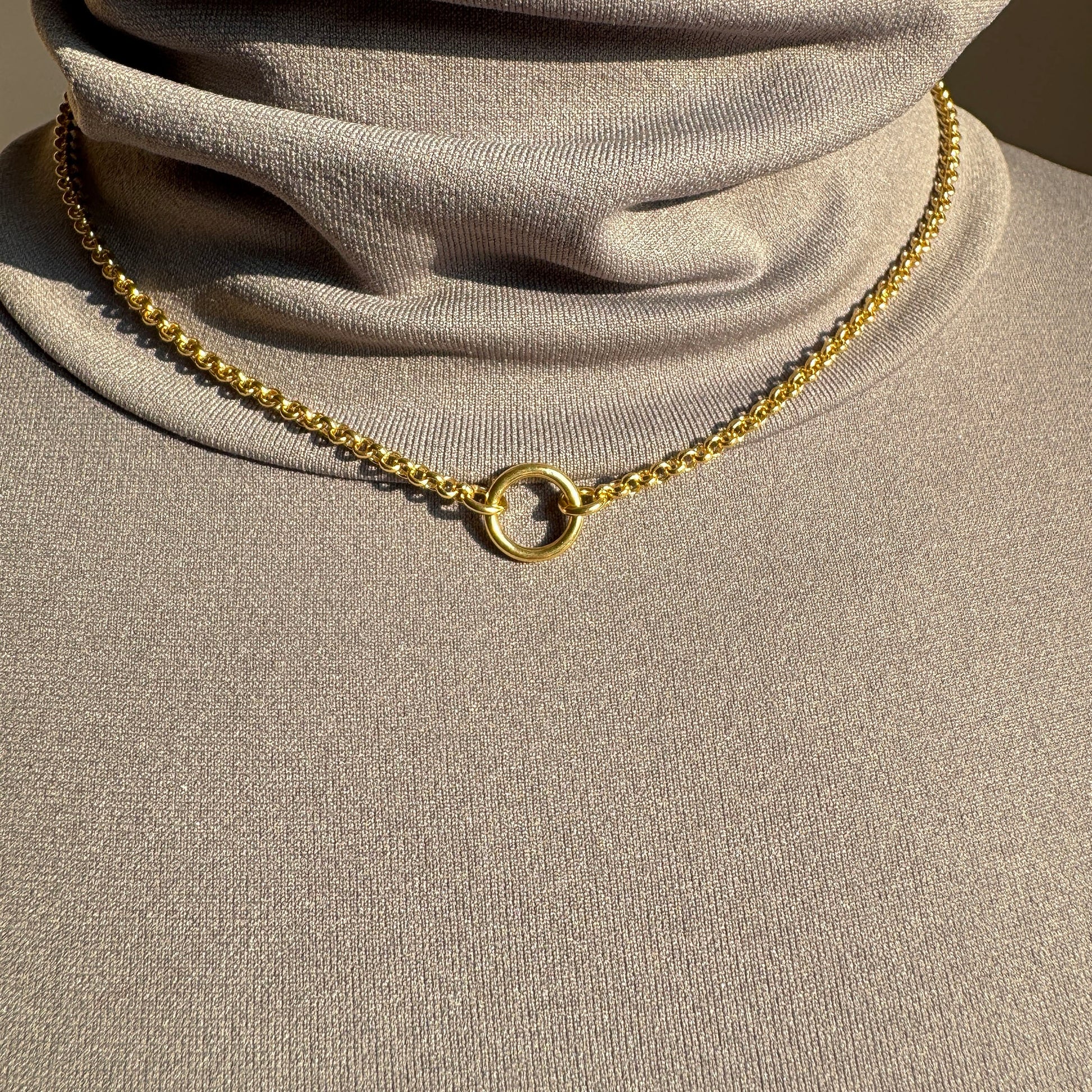 Elegant Pilgrim necklace with a delicate circle pendant in gold finish