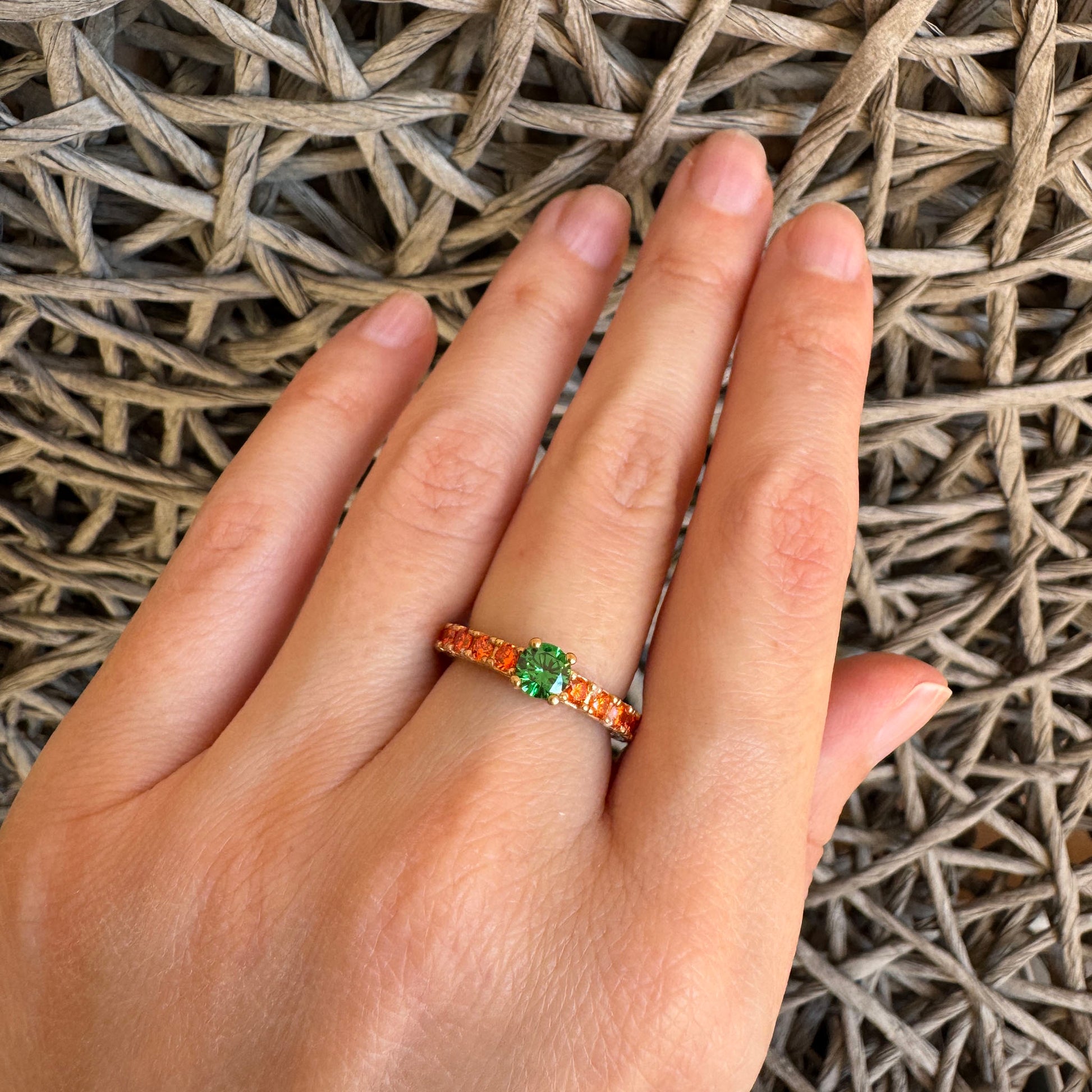 Green stone ring by Bliss Gioielli worn on the hand