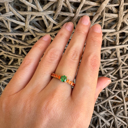 Green stone ring by Bliss Gioielli worn on the hand