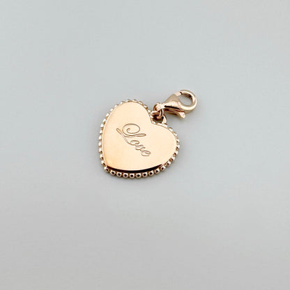 Thomas Sabo heart charm with rose gold plating and a delicate Love engraving
