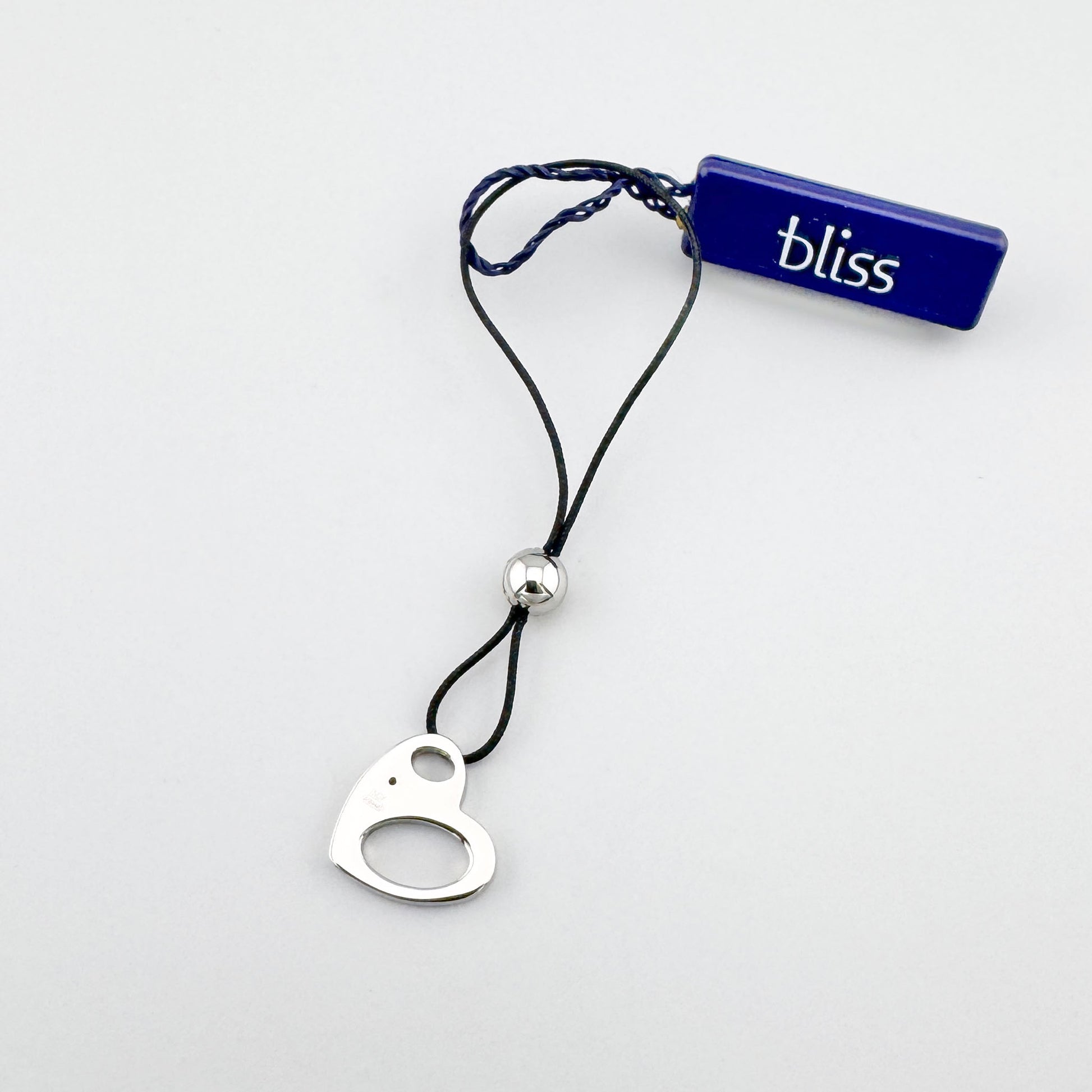Heart charm Bliss Gioielli with a black cord and polished steel finish