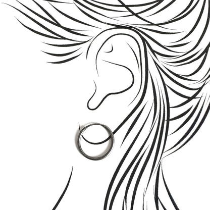 Silver hoop earrings LULU Copenhagen worn on the ear with a clean minimalist line