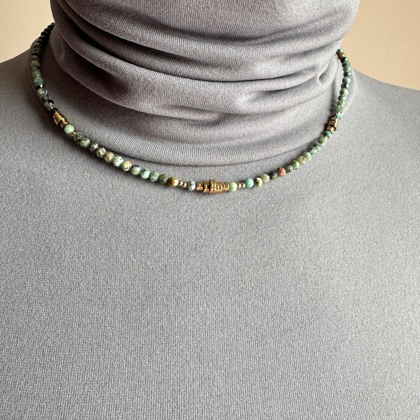 African jasper necklace IRL worn close to the neck with soft green and turquoise tones