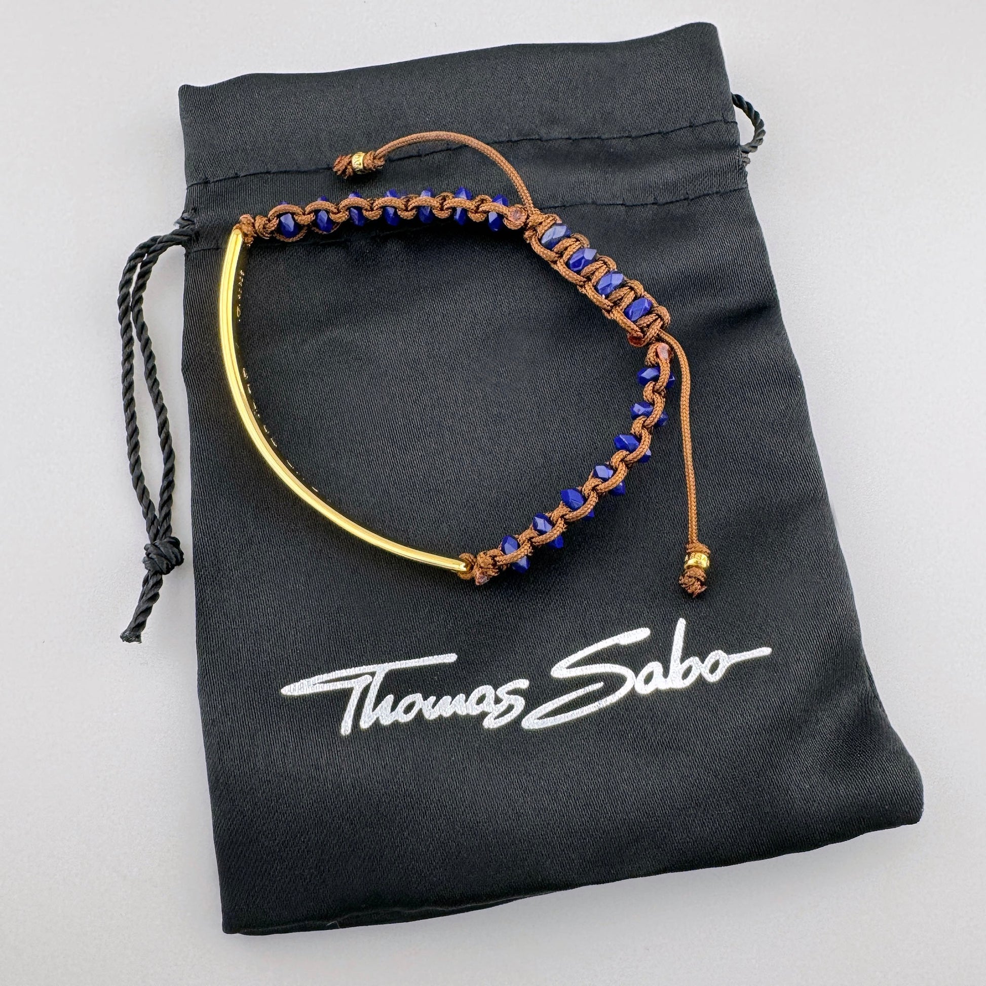 Lapis lazuli bracelet Thomas Sabo with braided cord and gold-tone center bar