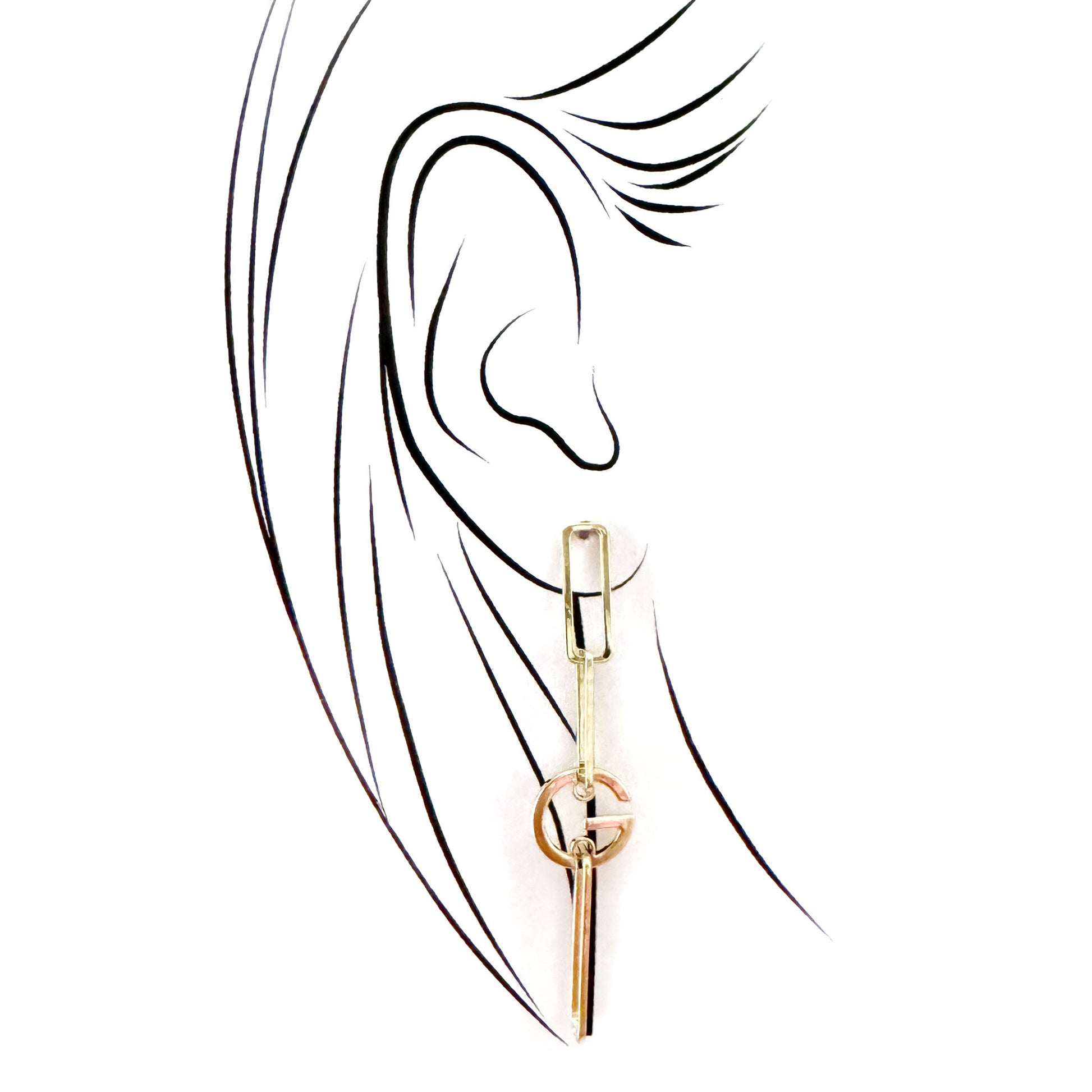 Long gold Cannelle earring styled on ear in elegant sketch