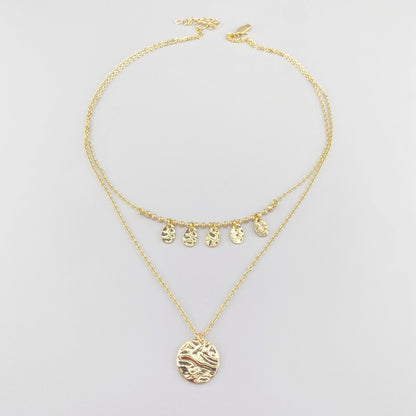 Collier IRL avec médaillons dorés martelés et chaîne fine réglable