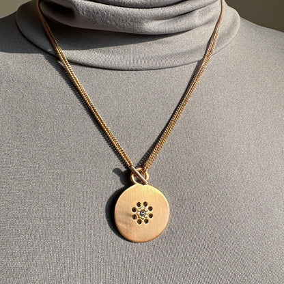 Elegant Pilgrim necklace with 2-in-1 medallion worn as short style close to neckline